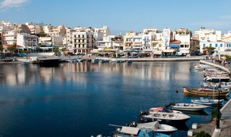 Agios Nikolaos, Crete - April 5 , 2015: Port of the touristic resort of Agios nikolaos city in  the coastal town of  the Greek island of Crete, in Greece.のeditorial素材