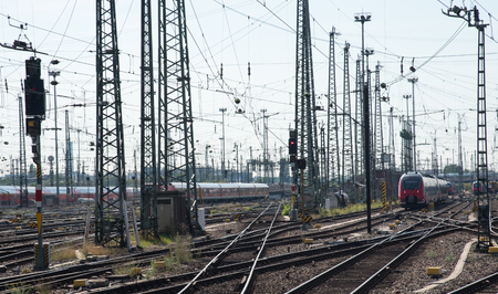 Railway main train station , Hauptbahnhof,  of Frankfurt city in Germany with red training arriving...