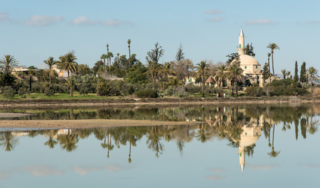 Famous Hala sultan Tekke Muslim shrine mosque located near the salt lake of Larnaca in Cyprusの写真素材