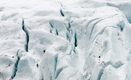 Unrecognized people hiking on the Vatna Glacier in Icelandの写真素材