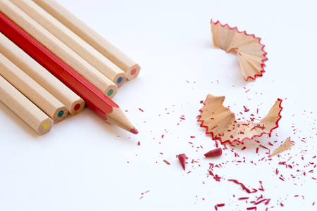 Color art pencils with sharpen red wooden pencils and shavings. Back to school conceptの写真素材