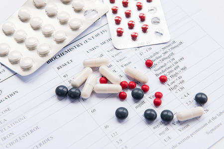 Medical diagnosis report drugs capsules and pills.