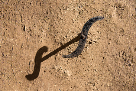 Metal window holder on a clay wallの写真素材
