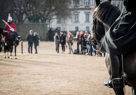 London, United Kingdom - January 18 2018: Members of the Queen's Royal Horse Guards on horses, riding to the changing of the guard ceremony in Horse Guards Parade, London United Kingdomのeditorial素材