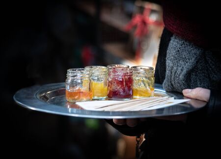 Woman holding a tray and servicing for taste, delicious homemade fruit orange, strawberry...