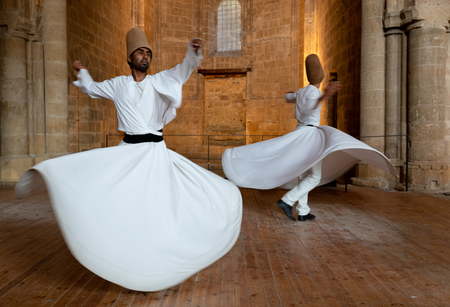 Nicosia, Cyprus, June 5 2019: Group of Dervishes performing the traditional and religious whirling dance or Sufi whirlingのeditorial素材