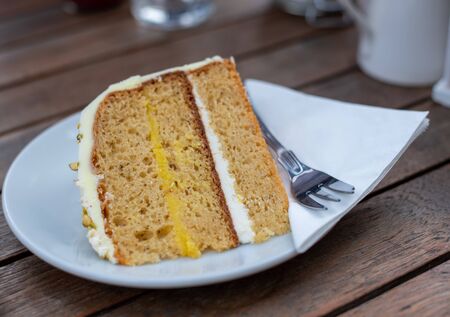 Slice of delicious and tasty Caramel Cake on a plate