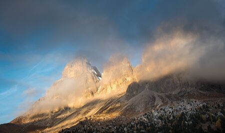 Foggy mountain landscape of the picturesque Dolomiti at Passo Sella area in South Tyrol in Italy.の写真素材