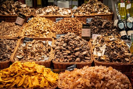 Barcelona, Spain- 26 January 2019: Variety of healthy dry fruits and vegetables in La  Bogueria Market fruit market in Barcelona, Spain.の写真素材
