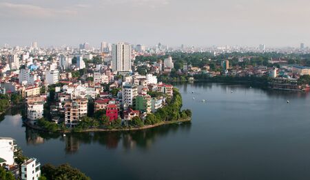The skyline of Hanoi in  the capital city of Vietnam in Asia late in the eveningの写真素材