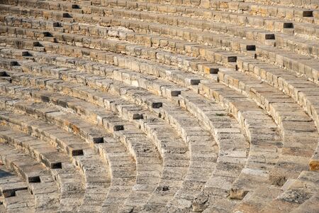 Empty steps and sittings of a stage arena from the ancient amphitheatre of Kourion in Limassol,...