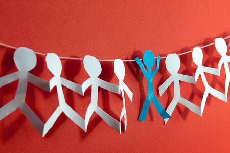 Human paper cut figures in a row. Diversity teamwork and culture concept.の写真素材