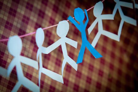 Human paper cut figures in a row. Diversity teamwork and culture concept.の写真素材