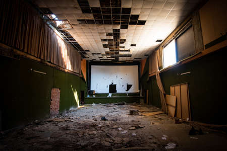 Abandoned and damaged interior of a stage theatre with bright light entering the building, Nicosia Cyprusの写真素材