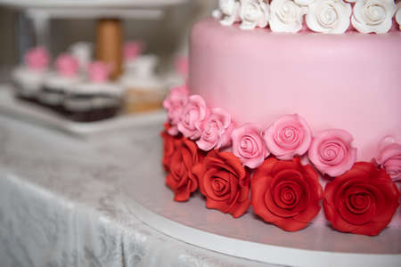 Sweet delicious birthday cake with sweet flowers decorationの写真素材