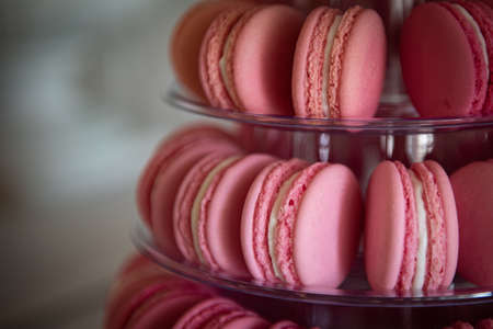 Pink color French delicious and sweet macaroons cookies.