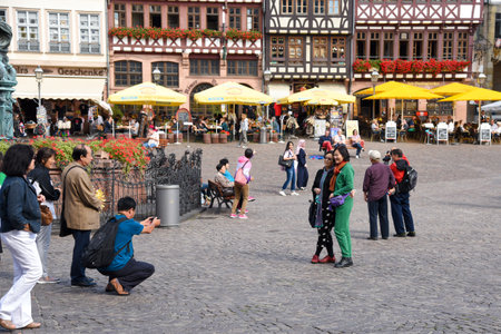 Tourist people taking photos at Romerberg square. Frankfurt Germanyのeditorial素材