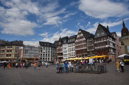 Romerberg square with tourist people walking at the city of Frankfurt in Germanyのeditorial素材