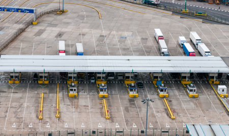 Trucks on Dover docks station before the customs to tranfer goods to France.のeditorial素材