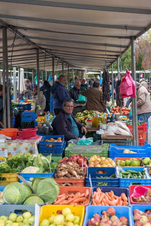 People buying groceries at a fruit and vegetable market in Nicosia Cyprusのeditorial素材