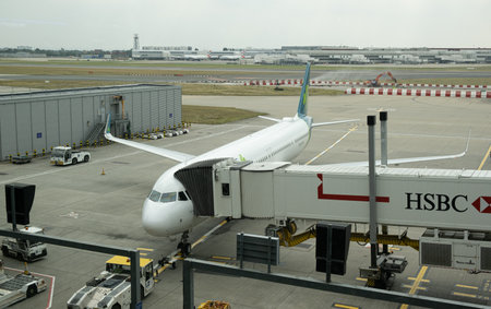 Airplane from aer lingus at London Heathrow airport LHR, in London. Aircraft is prepared for departure.のeditorial素材