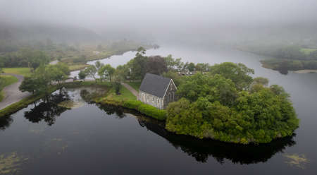 Aerial drone photo of St. Finbarrs Church, Gougane Barra, West irelandの写真素材