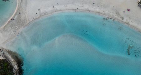 Aerial drone view of the coastline of empty beach in winter. Summer holidays.の写真素材