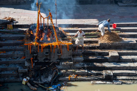Cremation ceremony at the hindu temple of pashupatinath complex. Nepal, Asiaのeditorial素材