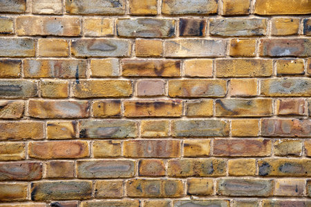 Architectural wall background with brown bricks. Abstract textured details