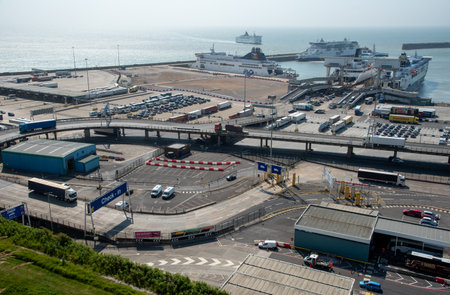 Trucks and ferries on port of Dover. Dover harbour connects Europe with United Kingdom.