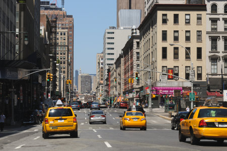 Medallion yellow taxi cabs on the streets of New York City, Usa