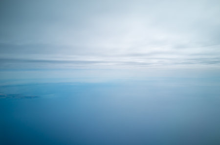 Cloudscape from above. blue sky cumulus clouds. Earth from above. Nature backgroundの写真素材