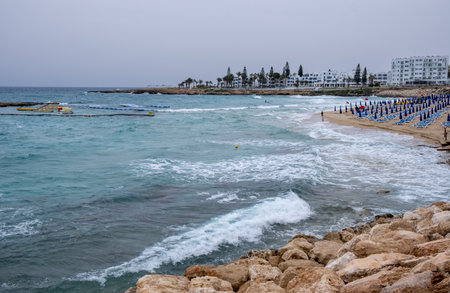 Stormy sandy beach. fig tree bay beach holiday resort protaras cyprusの写真素材