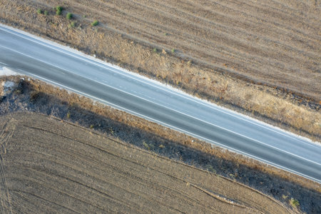 Drone aerial of countryside rural road. Dry land. Cyprus