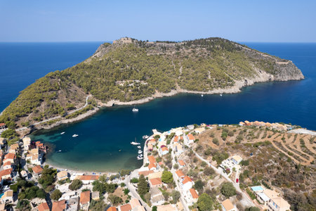 Drone aerial view of Greek village on the west coast of the island of Cephalonia , Kefalonia Greece in the island sea.の写真素材