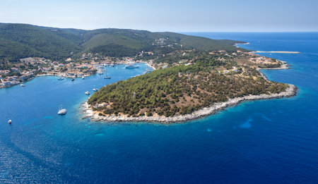 Drone aerial view Greek harbour village of Fiskardo on the Northern tip of Kefalonia Greek island , ionian sea.の写真素材