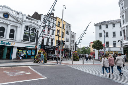 People walking at St Patric main shopping street Cork Ireland Europe