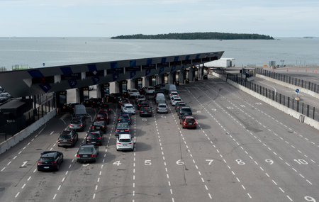 Helsinki port west terminal. Vehicles on the port ready for loading in a ferry. Tallink Shuttle to...