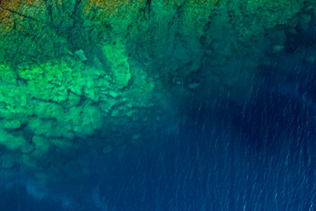 Drone view rocky sea coast with transparent turquoise water. Seascape top view, Kefalonia,...