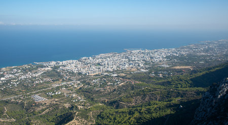 Breathtaking panoramic view of kyrenia city meeting the mediterranean sea, seen from saint hilarion...