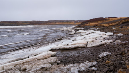 Typical Icelandic Frozen lake with big ice cubes, Iceland, early in springtime. Icelandic Arctic landscapeの写真素材