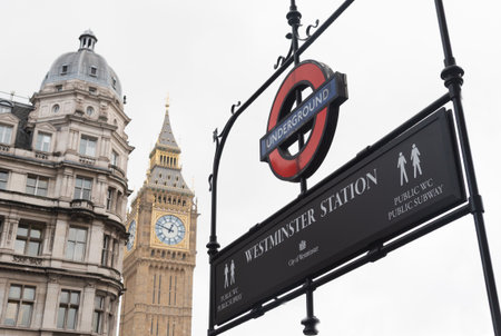 Westminster underground station sign with londons big ben