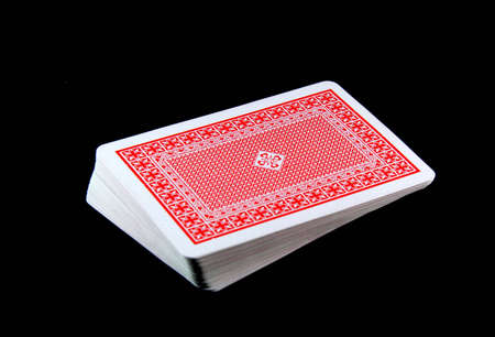 Playing cards on black background のeditorial素材