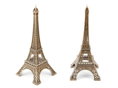 Small bronze copy of Eiffels Tower, isolated on white の写真素材