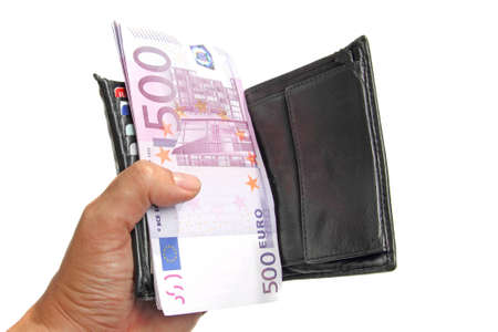 Hand holding a wallet with 500 euro banknotes の写真素材