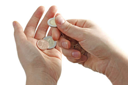 Hands with euro coins on white backgroundの写真素材