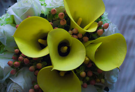 Bouquet of yellow lilies and rosesの写真素材