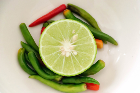 Lemon and chilli as garnish in Thai restaurants.の写真素材