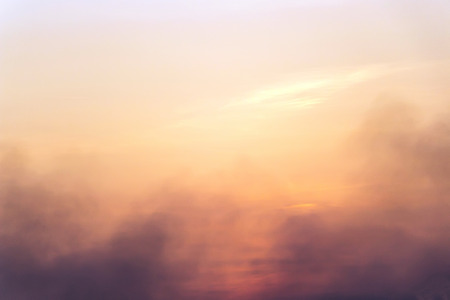 The sunset sky is covered with smoke.の写真素材