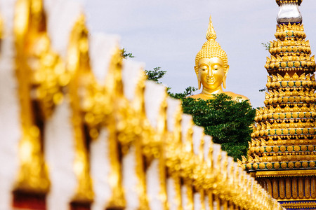 The back wall of the church is a Great golden Buddha.の写真素材